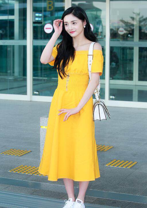 这么卖力美白不累么？只需一条黄色连衣裙，就能美到发光！
